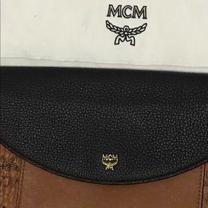 MCM Bag ....a 13 iPhone Plus fits, keys, CC,etc.